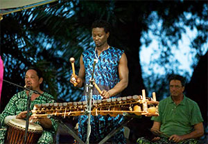 Sekou Camara playing instruments